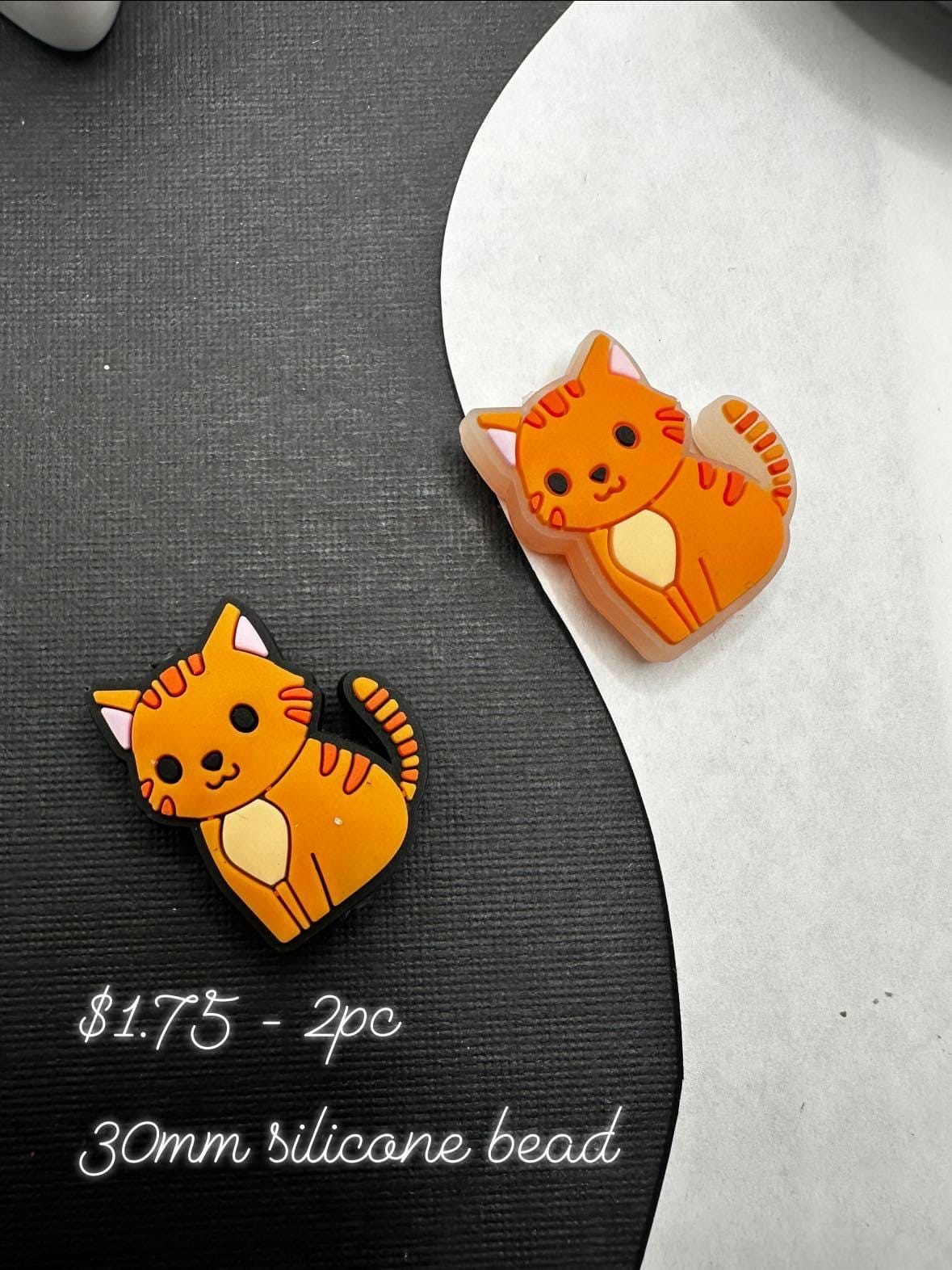 Silicone cat focal bead, one with glow bead, 2pc cat bead, beadable cat bead, crafting, bead supplies 2pc one glows